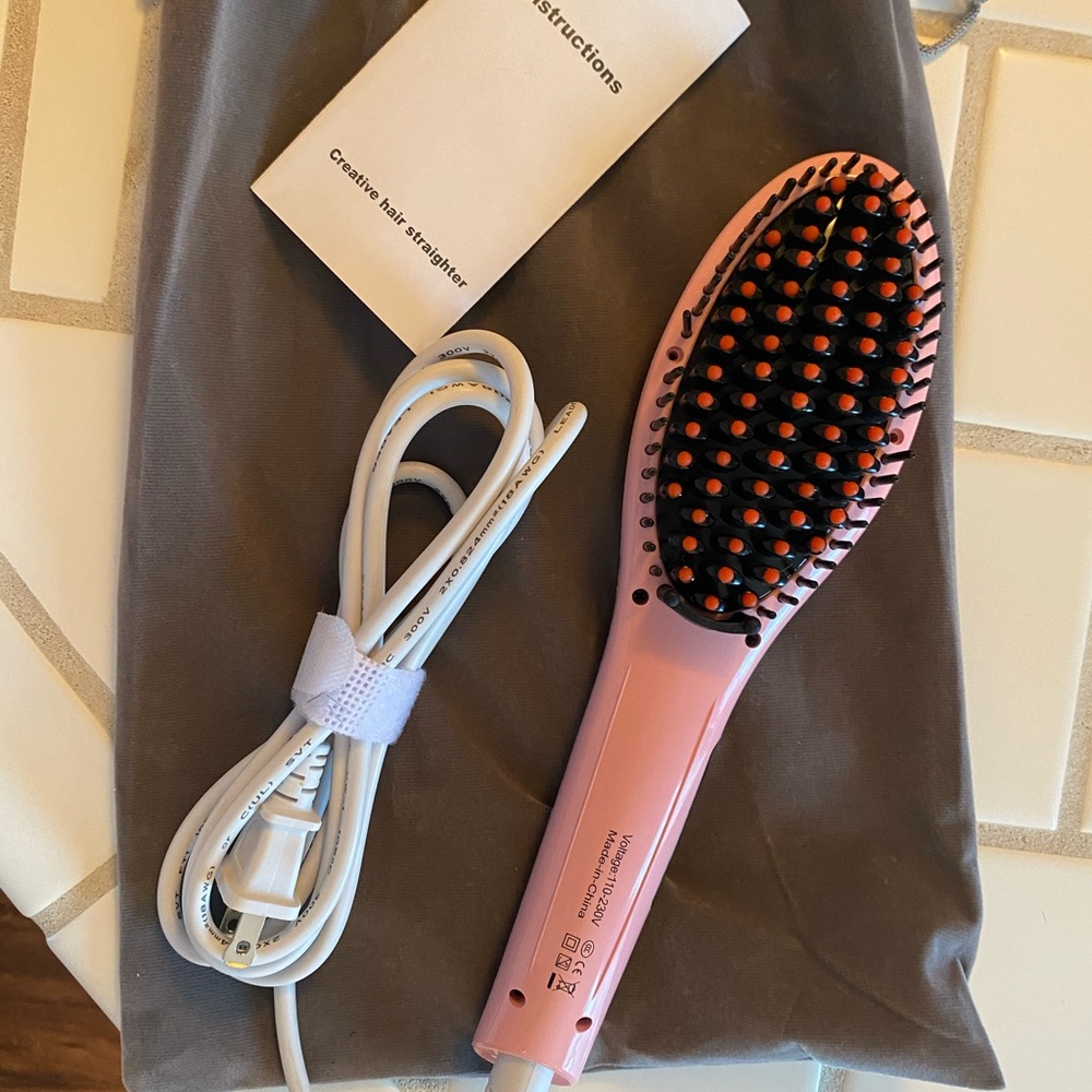 Heated straightening brush